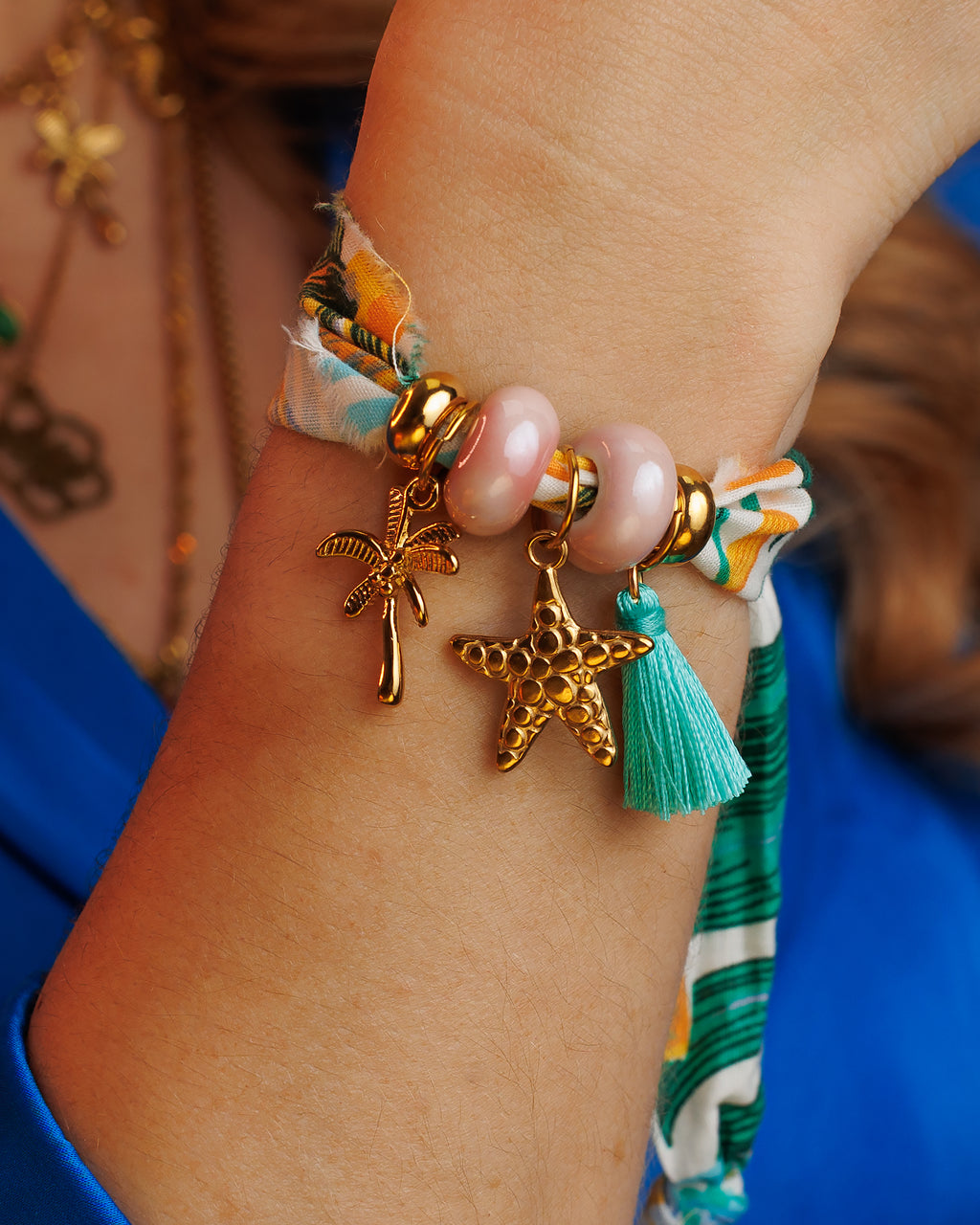 Pulsera de tela con estrella de mar y palma