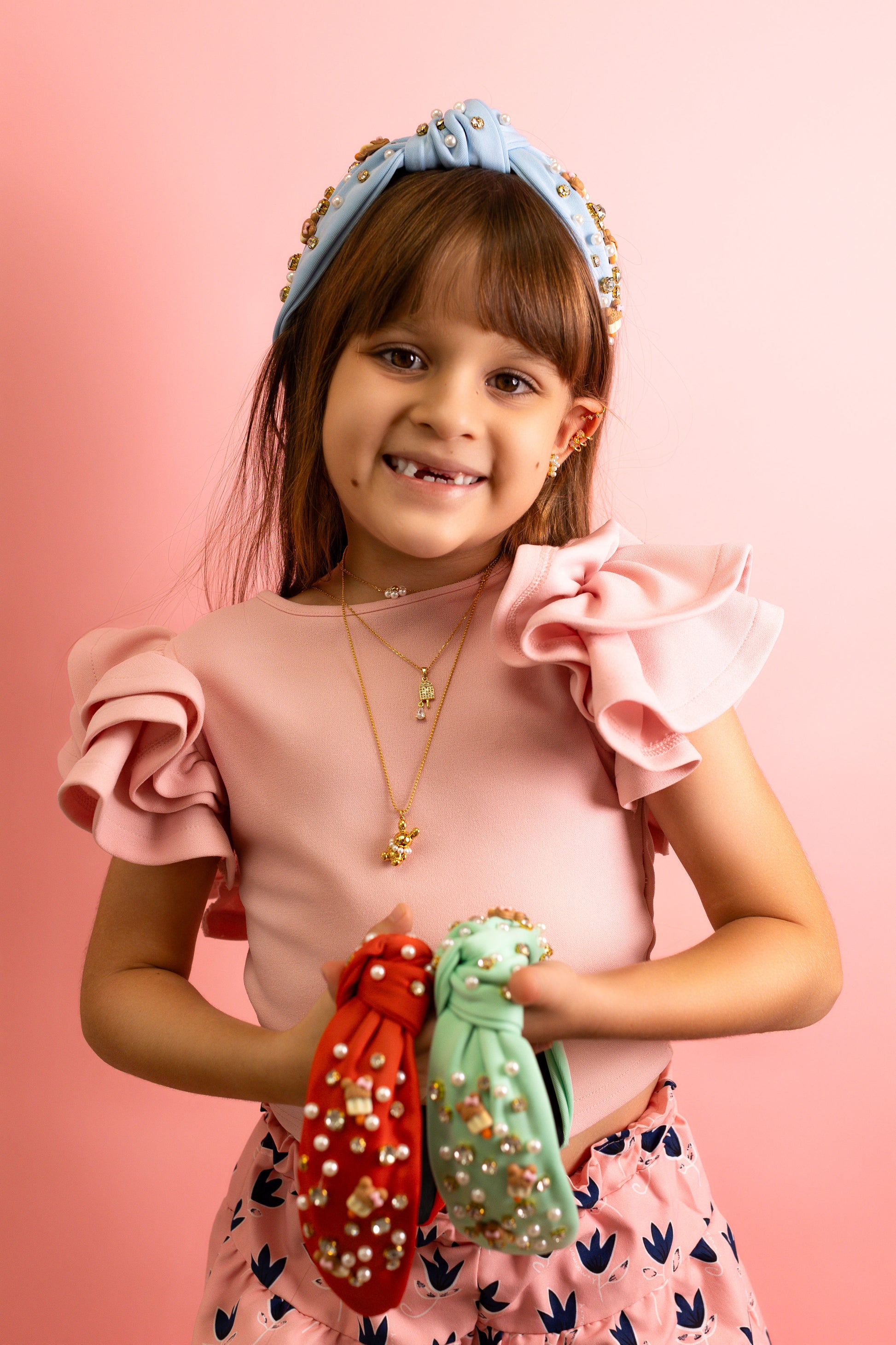 Diadema de perlas y paletas