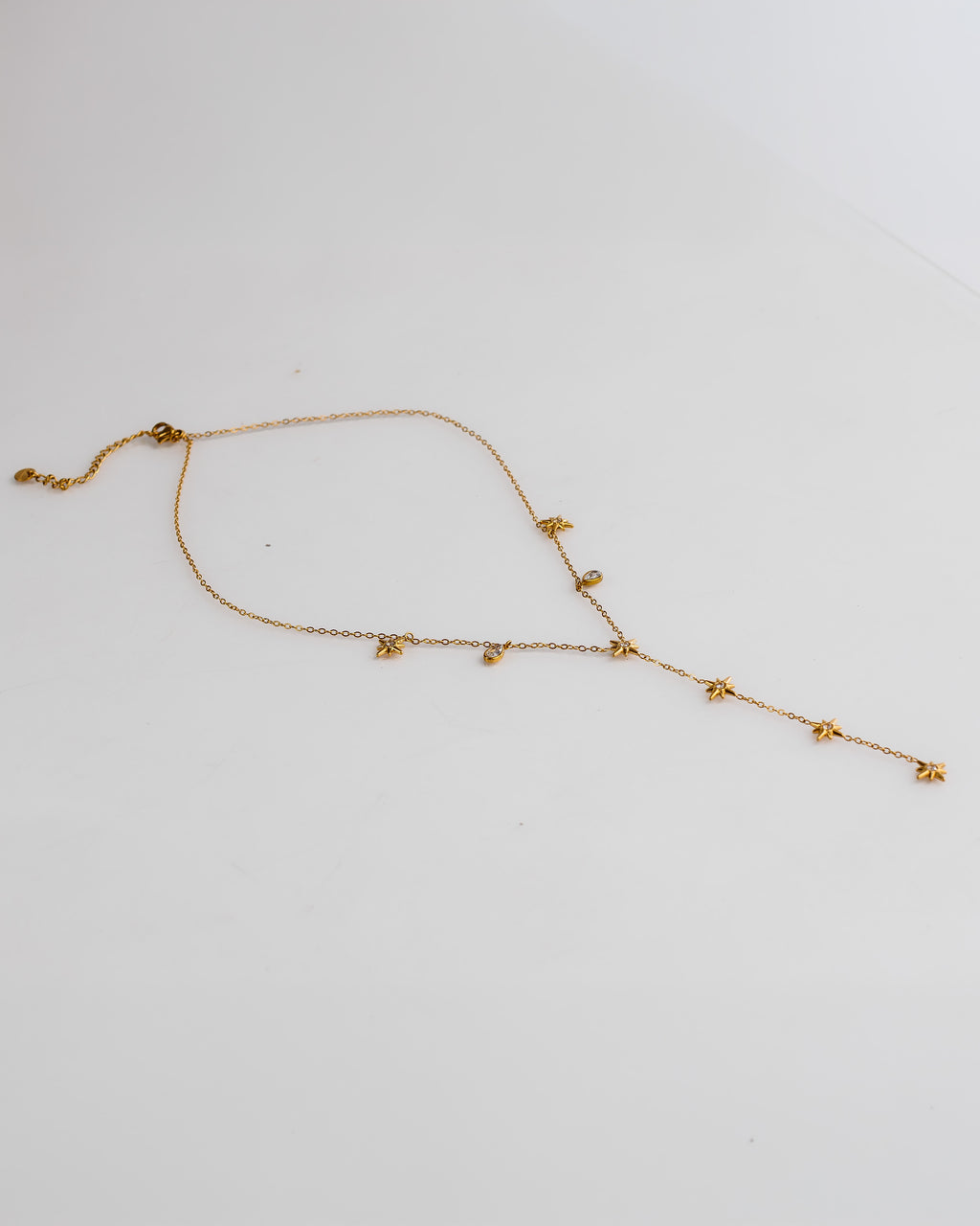 Collar en Y con estrellas y gotas