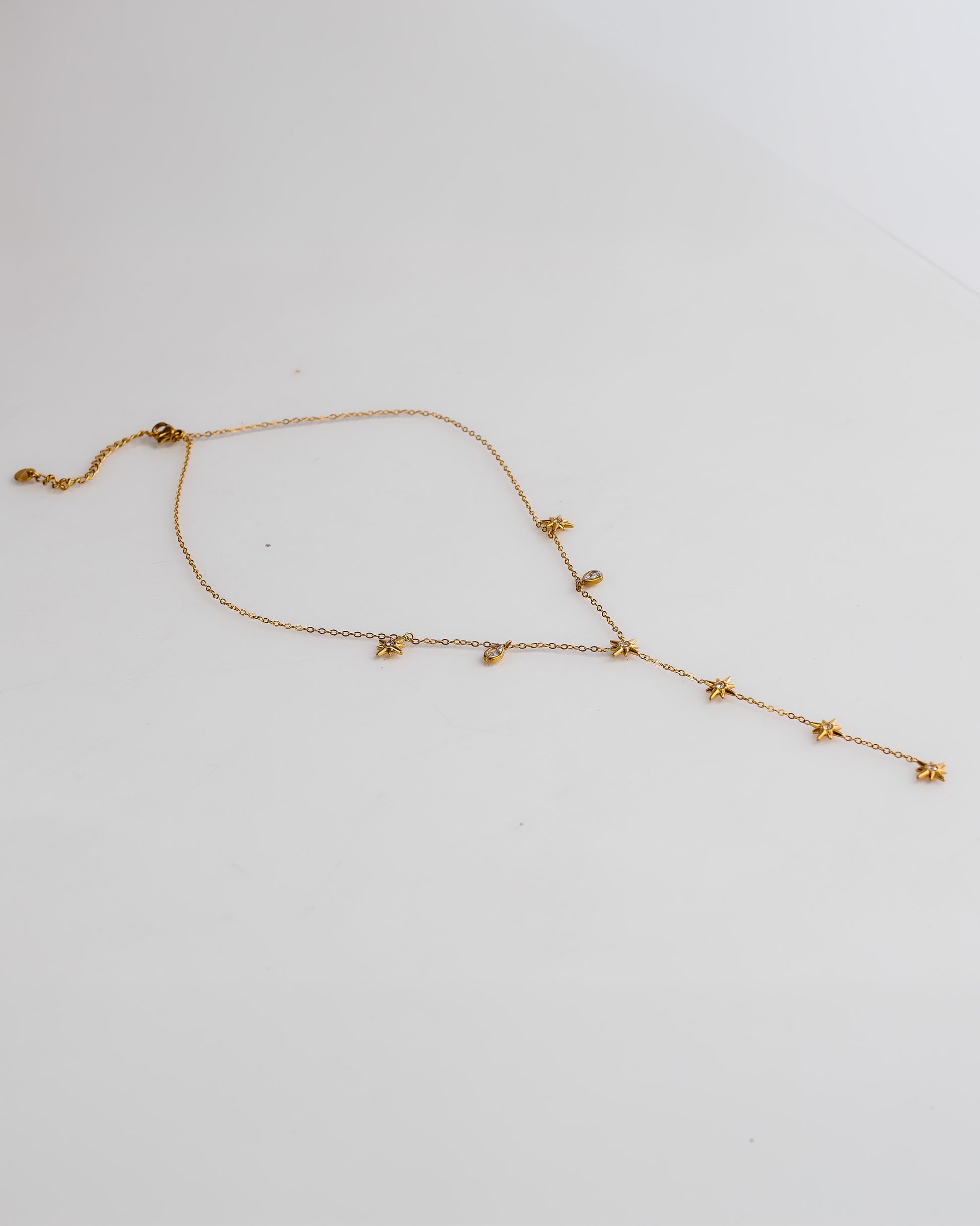 Collar en Y con estrellas y gotas