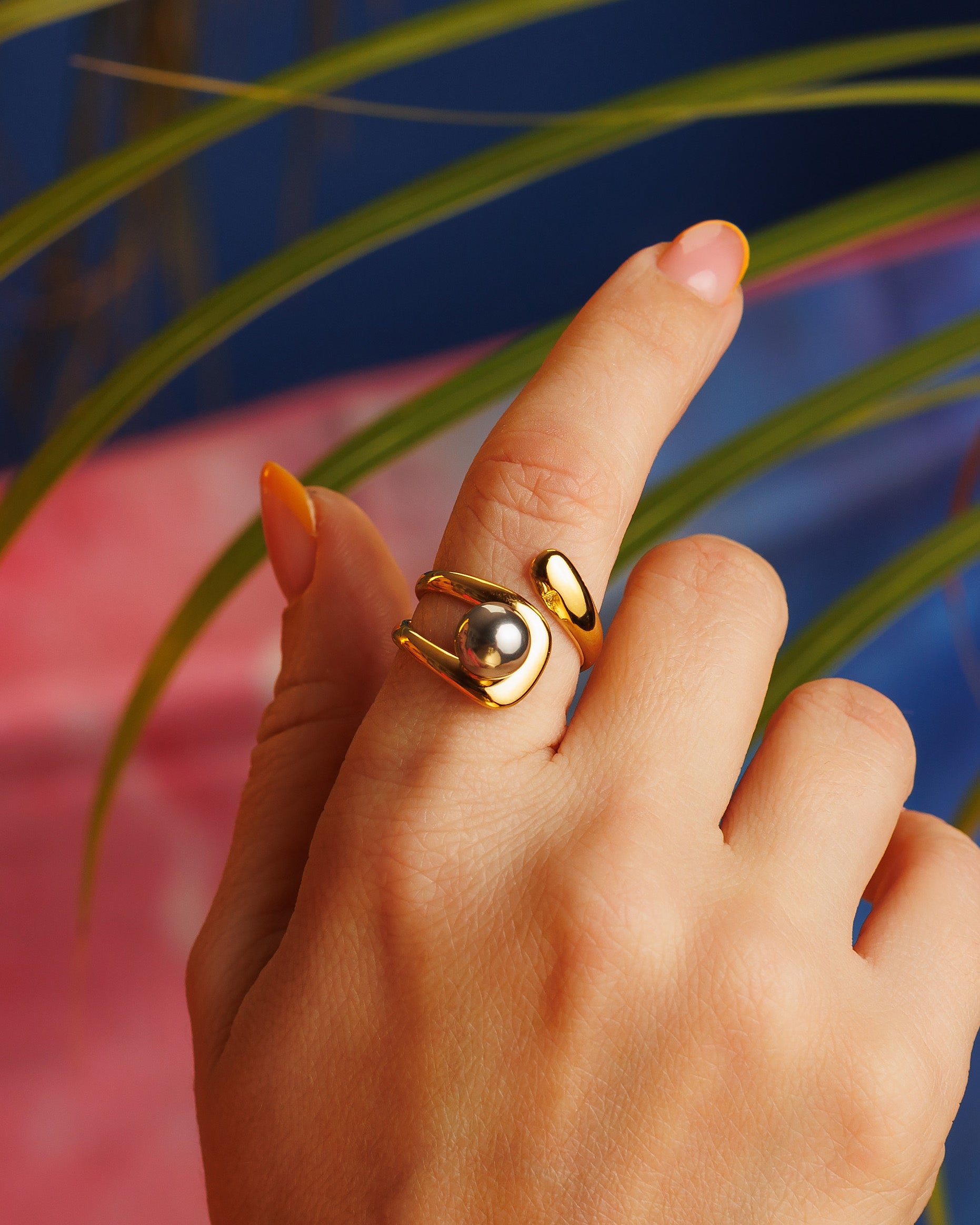 Anillo dorado y plata