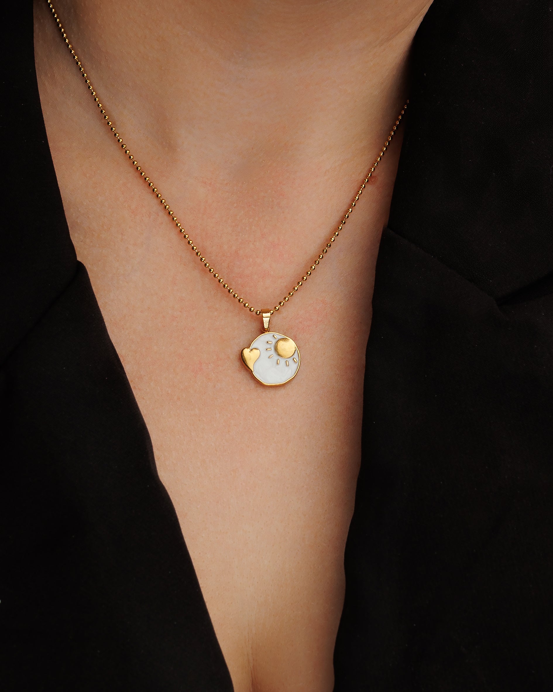 Collar sol y corazón con perla nácar